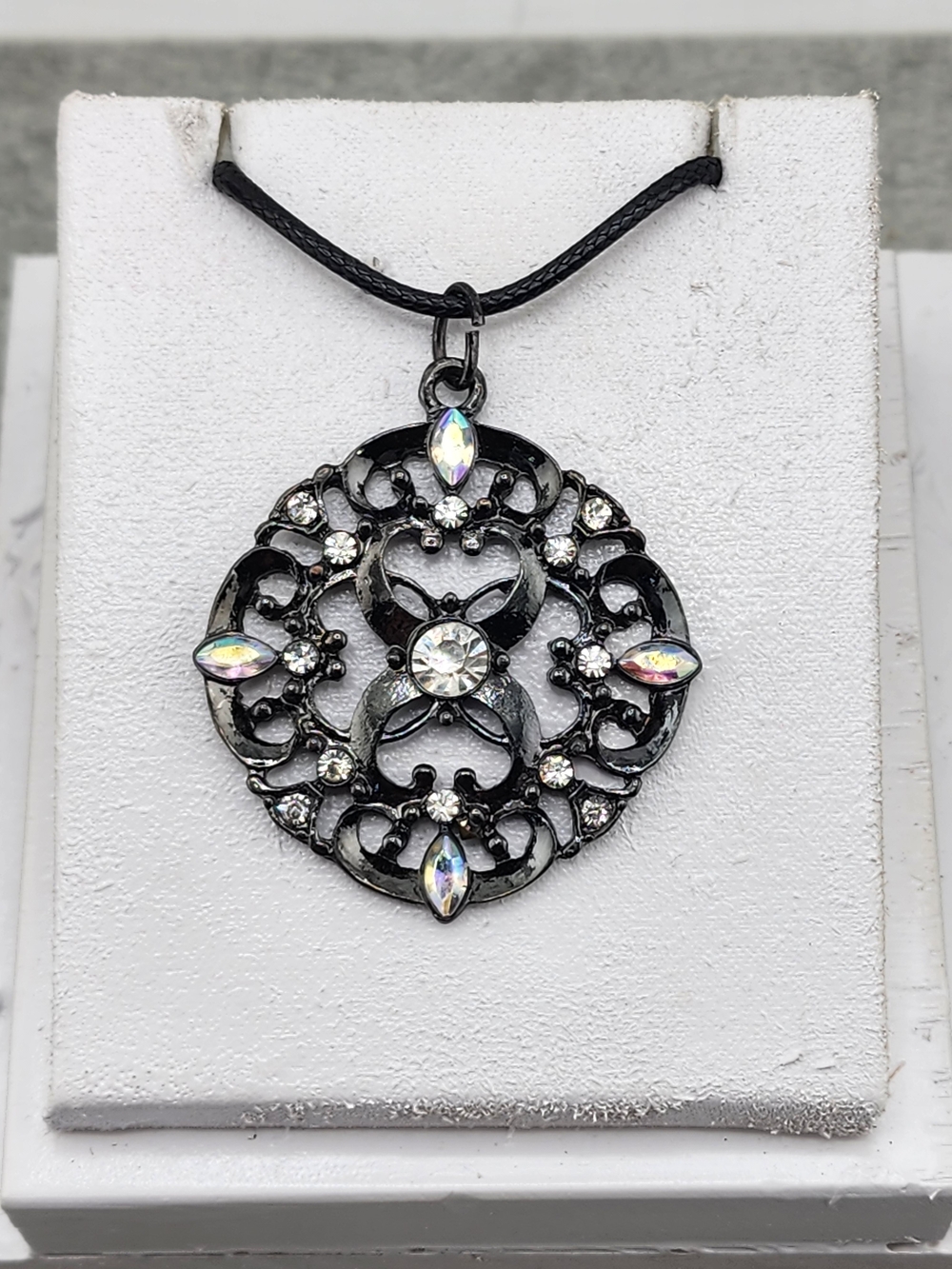 Black Filigree Pendant Necklace with Iridescent Crystals